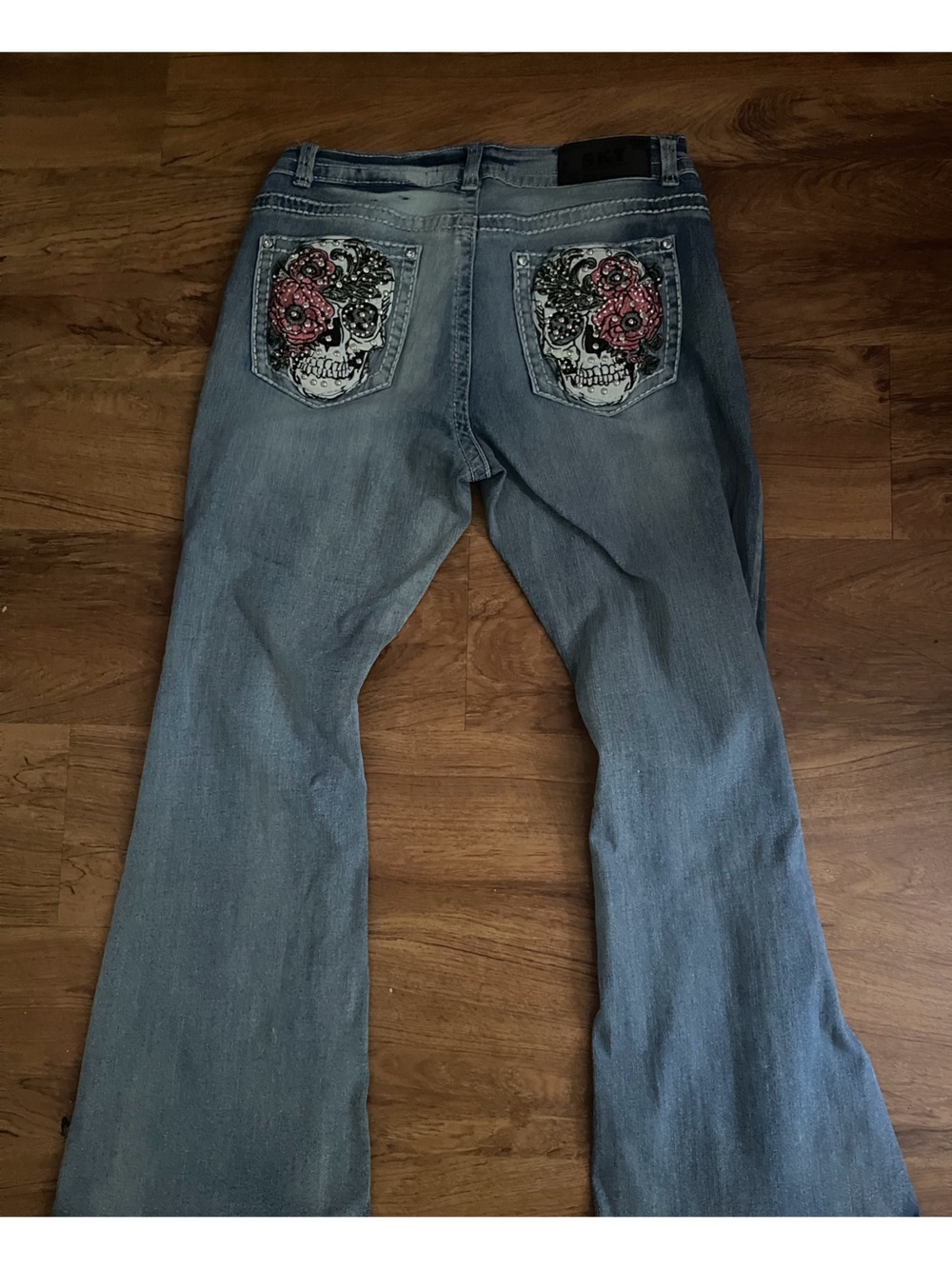 Sky Light Blue Flared Jeans with Embroidered Skull Pockets